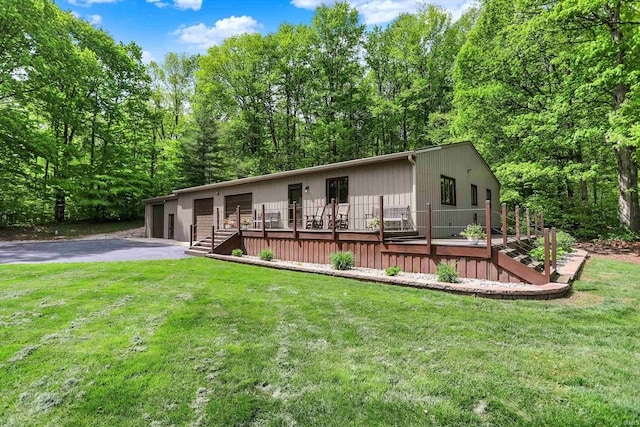 5571 Poff Rd, Martinsville, IN 46151 - view of front of home featuring a wooden deck and a front lawn
