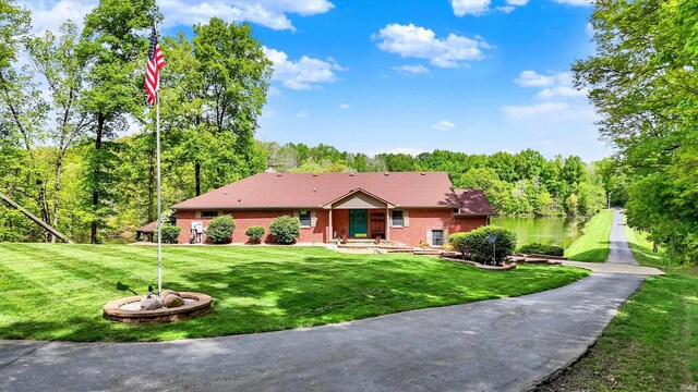 5571 Poff Rd, Martinsville, IN 46151 - ranch-style home featuring a front lawn and brick siding