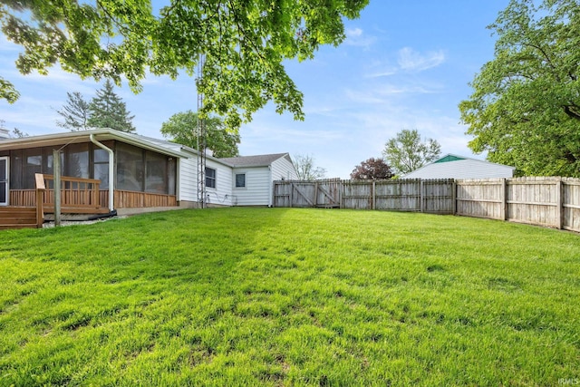 view of yard with a sunroom
