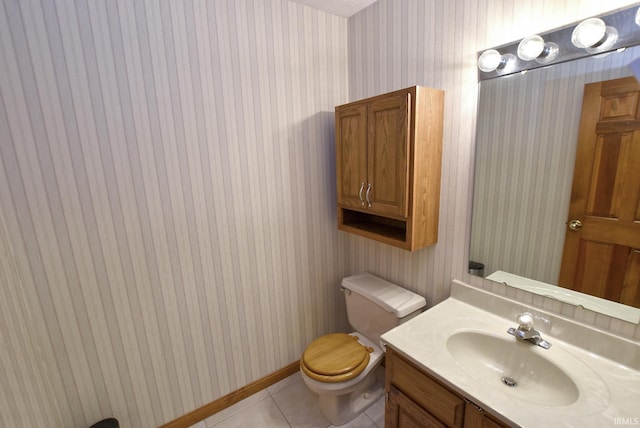 3010 Cypress Ct, Evansville, IN 47711 - half bath featuring wallpapered walls, tile patterned flooring, toilet, vanity, and baseboards