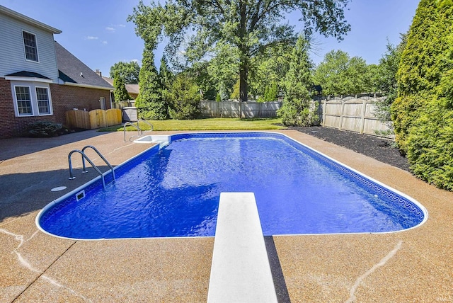 3010 Cypress Ct, Evansville, IN 47711 - view of swimming pool featuring a fenced backyard, a diving board, and a patio area