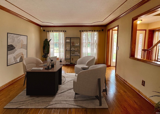 3010 Cypress Ct, Evansville, IN 47711 - living room featuring a textured ceiling, light wood-style flooring, baseboards, an office area, and ornamental molding