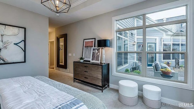 571 Tamarind Dr, West Lafayette, IN 47906 - carpeted bedroom featuring baseboards and a chandelier