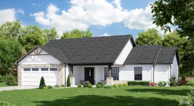 view of front of house with an attached garage, a front yard, and concrete driveway