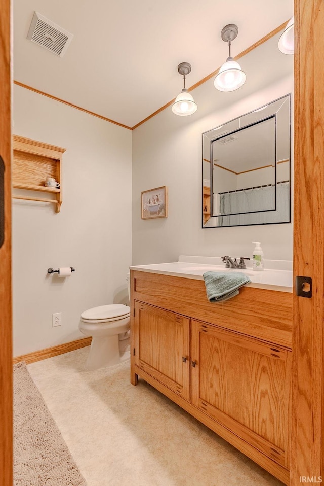 1918 Mckibben St, Wabash, IN 46992 - bathroom featuring toilet, vanity, crown molding, and baseboards