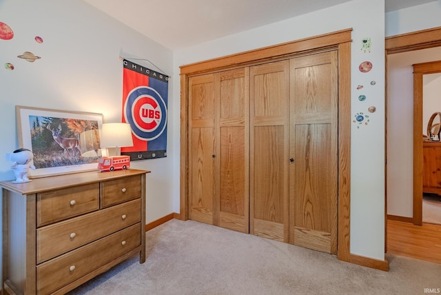 1918 Mckibben St, Wabash, IN 46992 - bedroom with light carpet, a closet, and baseboards