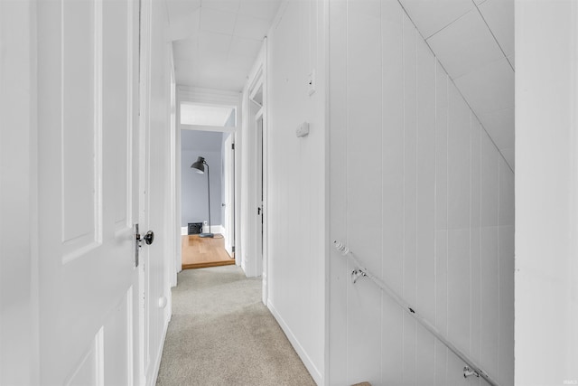 corridor with light colored carpet