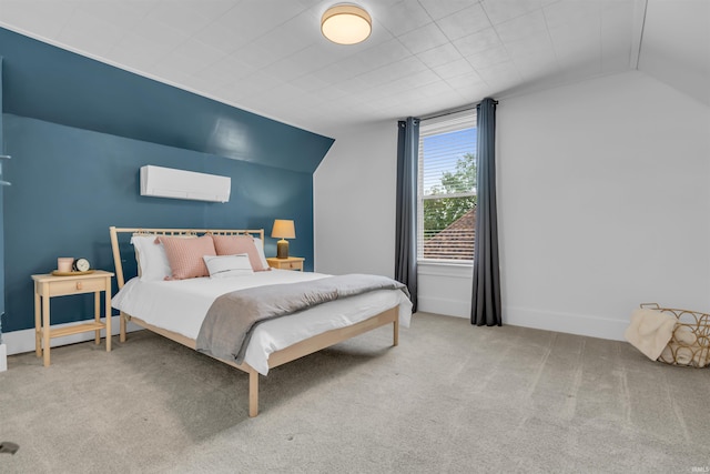 carpeted bedroom with vaulted ceiling and baseboards