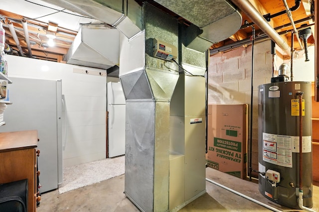 utility room featuring water heater