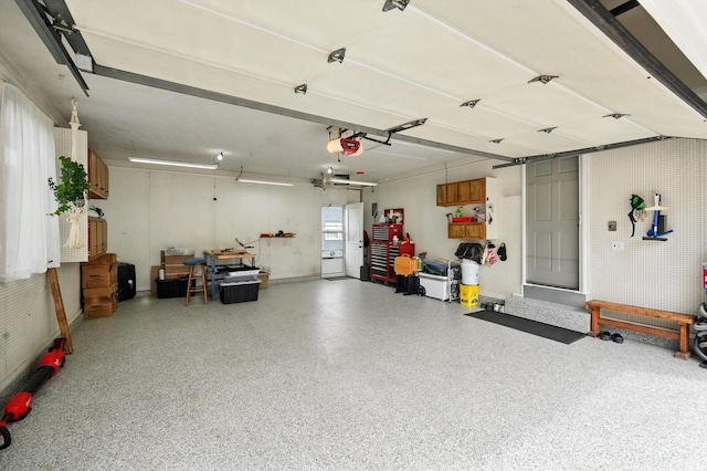 garage featuring a garage door opener