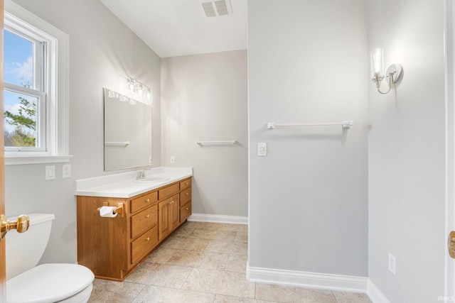 5006 Vandolah Rd, Leo, IN 46765 - bathroom with baseboards, vanity, and toilet
