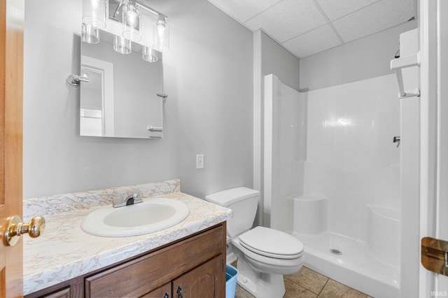 5006 Vandolah Rd, Leo, IN 46765 - full bath featuring a drop ceiling, vanity, walk in shower, tile patterned flooring, and toilet