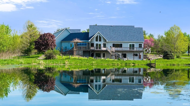 5006 Vandolah Rd, Leo, IN 46765 - rear view of property featuring stairs, a deck with water view, and roof with shingles