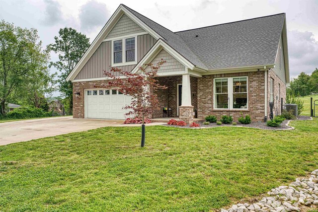 6055 Logel Rd, Newburgh, IN 47630 - craftsman-style home featuring concrete driveway, brick siding, board and batten siding, and a shingled roof