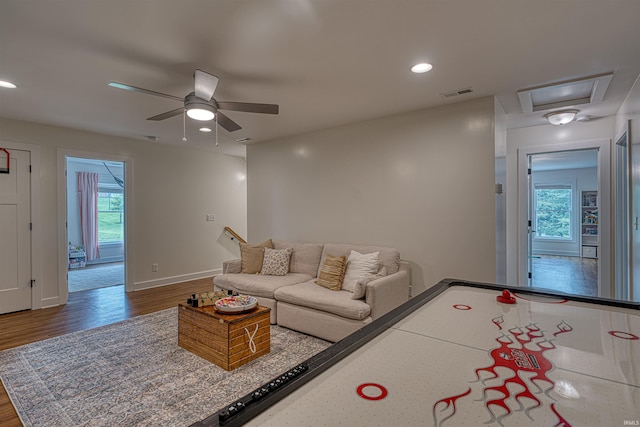 6055 Logel Rd, Newburgh, IN 47630 - living area featuring wood finished floors, a ceiling fan, baseboards, and recessed lighting