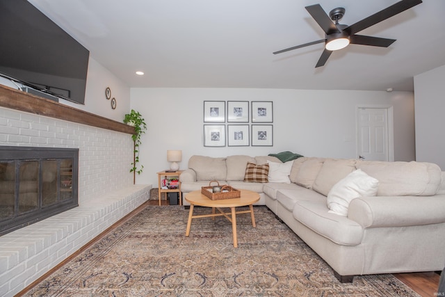 4100 Triple Crown Dr, Newburgh, IN 47630 - living area with a ceiling fan, a brick fireplace, wood finished floors, and recessed lighting