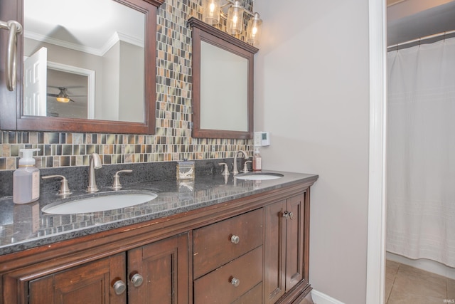 4100 Triple Crown Dr, Newburgh, IN 47630 - bathroom featuring ornamental molding, double vanity, tile patterned floors, and baseboards