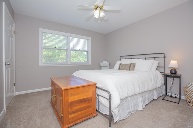 4100 Triple Crown Dr, Newburgh, IN 47630 - bedroom with light colored carpet, baseboards, and a ceiling fan