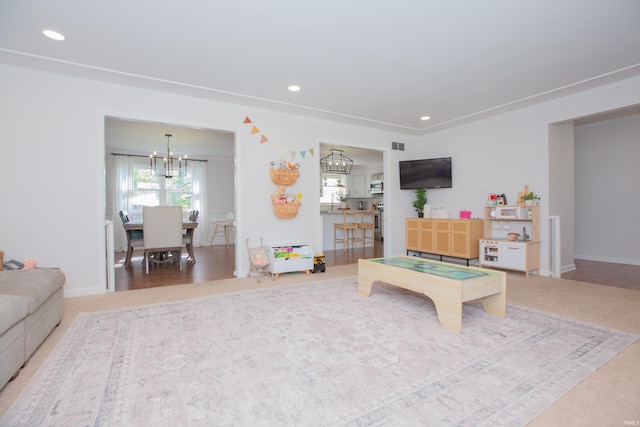 4100 Triple Crown Dr, Newburgh, IN 47630 - playroom featuring a chandelier, crown molding, recessed lighting, and baseboards