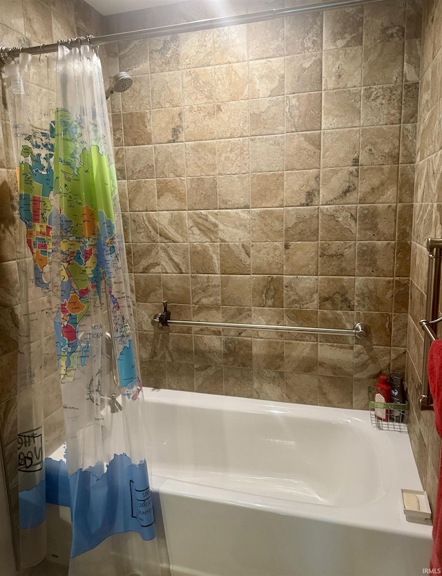 bathroom with shower / bath combo