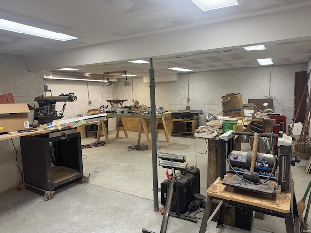 basement featuring a workshop area