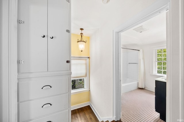 1602 Cedar St, South Bend, IN 46617 - hallway featuring baseboards and dark wood-style floors