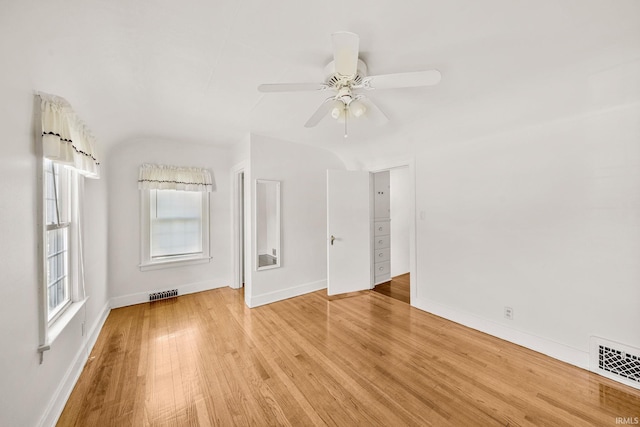 1602 Cedar St, South Bend, IN 46617 - spare room with light wood-type flooring, baseboards, and a ceiling fan