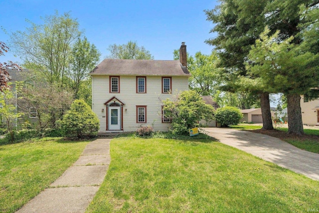 1602 Cedar St, South Bend, IN 46617 - colonial inspired home featuring a chimney and a front lawn