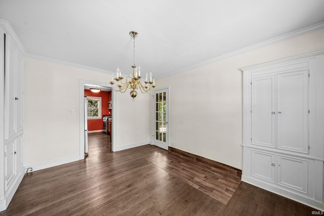 1602 Cedar St, South Bend, IN 46617 - unfurnished dining area with a chandelier, dark wood-type flooring, ornamental molding, and baseboards