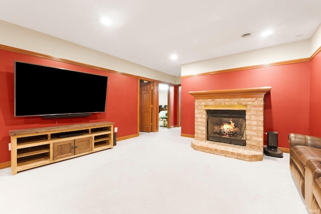 living area with a fireplace, carpet flooring, recessed lighting, and baseboards