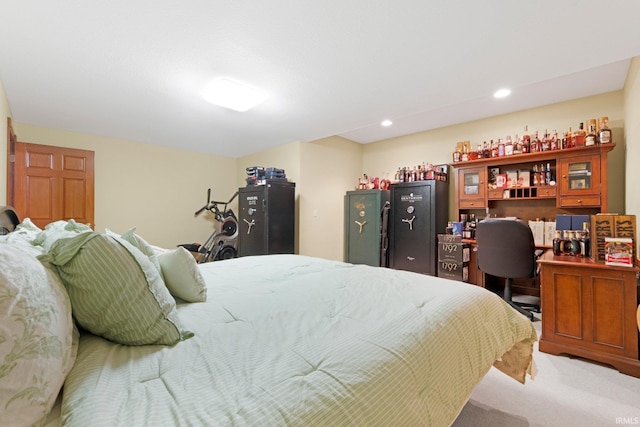 carpeted bedroom with a desk and recessed lighting