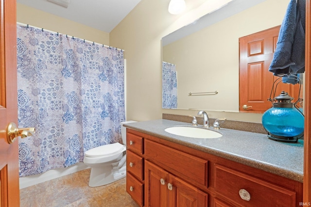 bathroom featuring vanity, toilet, curtained shower, and tile patterned floors