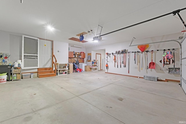 garage featuring a garage door opener