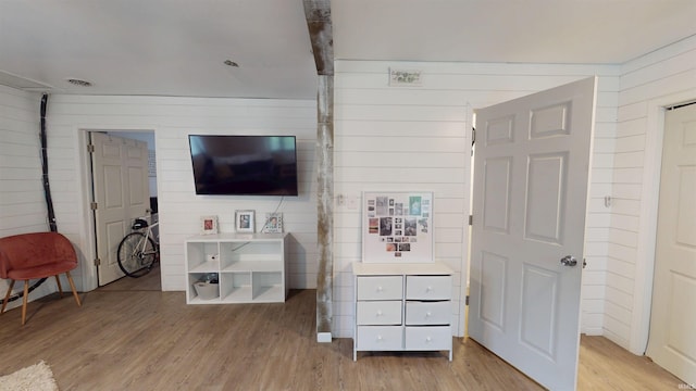 1804 W 11th St, Marion, IN 46953 - bedroom featuring light wood-type flooring and wooden walls