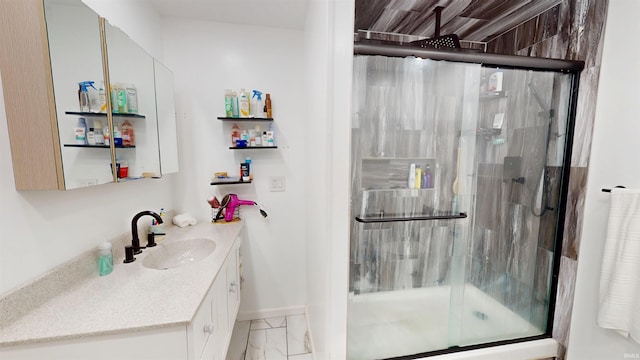 1804 W 11th St, Marion, IN 46953 - full bathroom with a stall shower, vanity, marble look tile flooring, and baseboards
