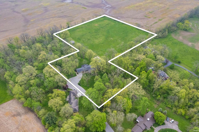 aerial view of sparsely populated area featuring property parcel outlined