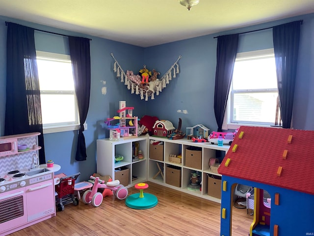 2800 E Bernice Dr, Bloomington, IN 47401 - playroom featuring healthy amount of natural light and wood finished floors