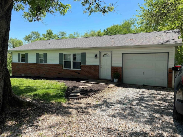 2800 E Bernice Dr, Bloomington, IN 47401 - ranch-style house with brick siding, a garage, and driveway