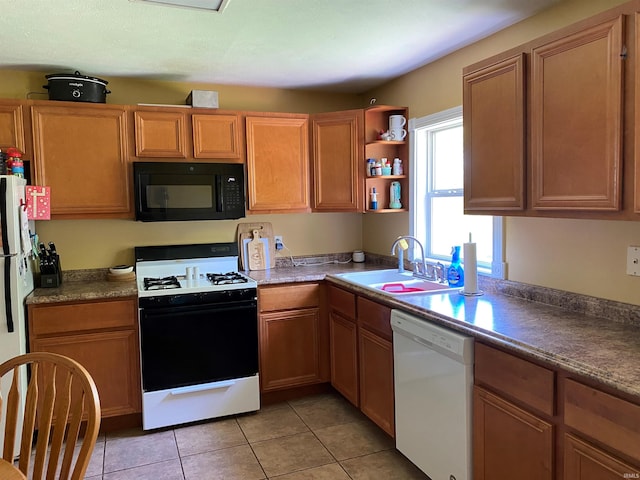 2800 E Bernice Dr, Bloomington, IN 47401 - kitchen with white appliances, a sink, open shelves, and light tile patterned flooring