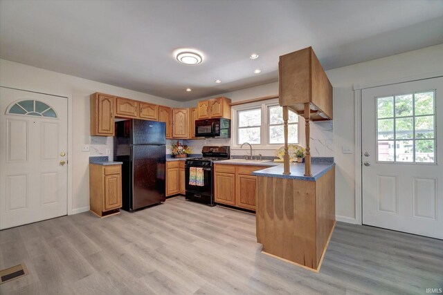 4184 Walker Ln, Unionville, IN 47468 - kitchen featuring black appliances, a sink, light wood finished floors, baseboards, and recessed lighting