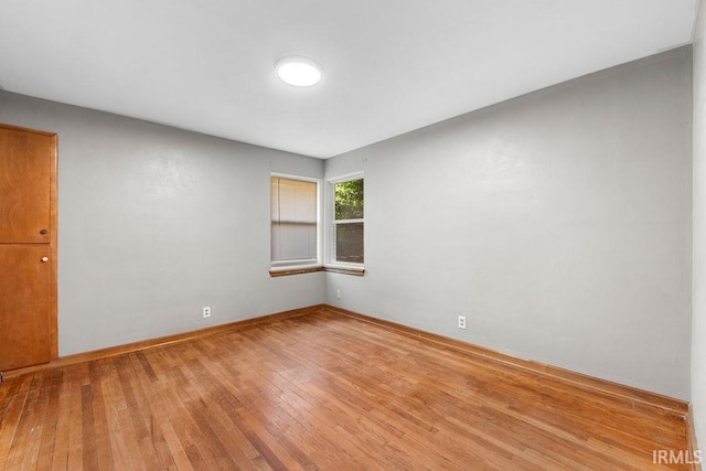 221 S Ironwood Dr, South Bend, IN 46615 - empty room with light wood-style floors and baseboards