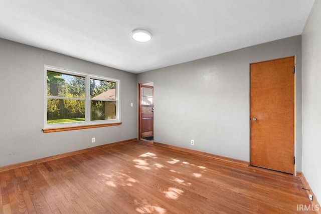 221 S Ironwood Dr, South Bend, IN 46615 - unfurnished room with hardwood / wood-style flooring and baseboards