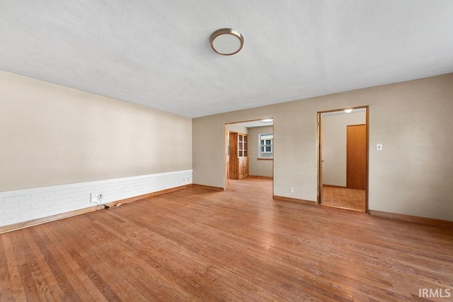 221 S Ironwood Dr, South Bend, IN 46615 - spare room with light wood-style flooring and baseboards