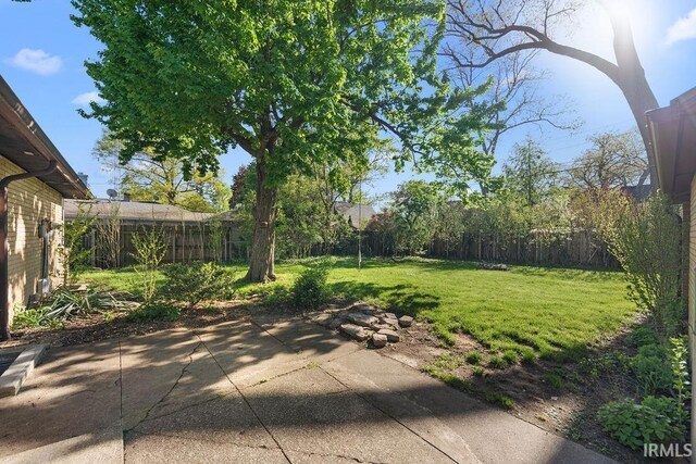 221 S Ironwood Dr, South Bend, IN 46615 - view of yard featuring a patio