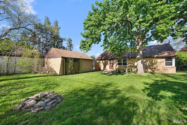 221 S Ironwood Dr, South Bend, IN 46615 - view of yard featuring an outbuilding