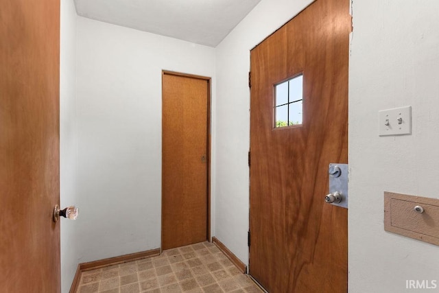 221 S Ironwood Dr, South Bend, IN 46615 - entryway featuring baseboards