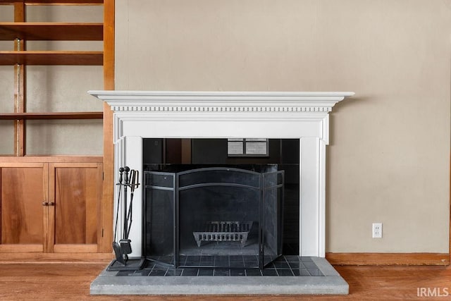 221 S Ironwood Dr, South Bend, IN 46615 - detailed view of wood finished floors and a fireplace