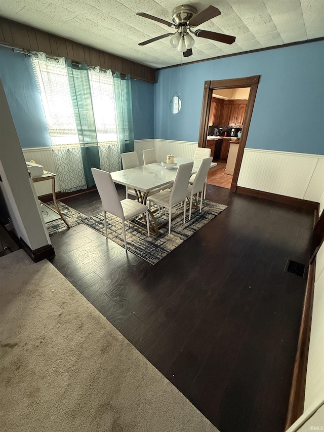 255 W Main St, Peru, IN 46970 - dining room featuring a wainscoted wall and ceiling fan