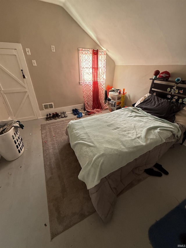 255 W Main St, Peru, IN 46970 - bedroom with lofted ceiling and finished concrete flooring