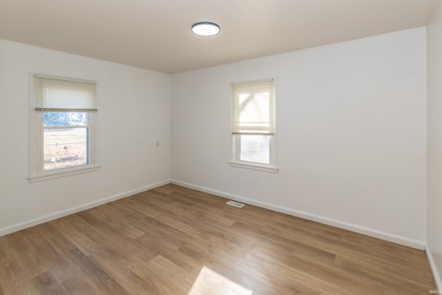 1926 E 17th St, Muncie, IN 47304 - unfurnished room with light wood-style flooring and baseboards